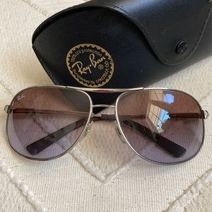 Ray Ban sunglasses.